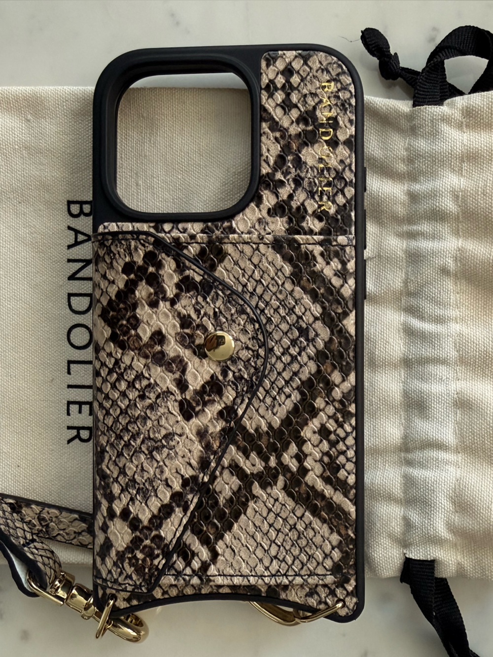 Bandolier Snake-Print Crossbody Phone Case in Black and Tan with Gold Hardware